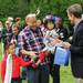 Dug Song, with Jaegun Song, 7, and Quynh Song, 2, accept their "Most Patriotic Outfit" award after the Memorial Day Parade on Monday, May 27. Ben Freed I AnnArbor.com